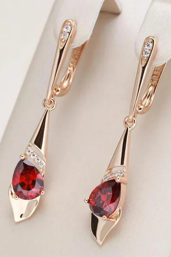 Exquisito colgante con pendientes de cristal rojo | Oro