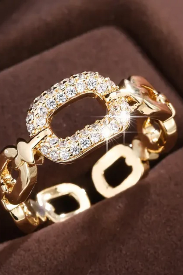 ANILLO DORADO CON CADENA BRILLANTE