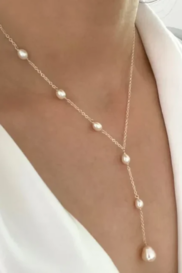 ELEGANTE COLGANTE DE RUBÍ Y COLLAR DE PERLAS