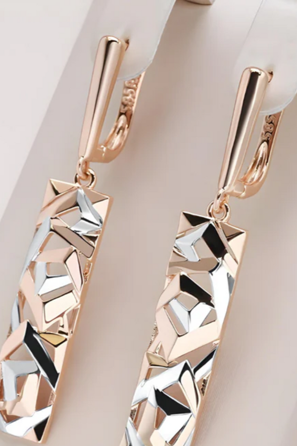 PENDIENTES LARGOS BAÑADOS EN ORO ROSA CON GRABADOS