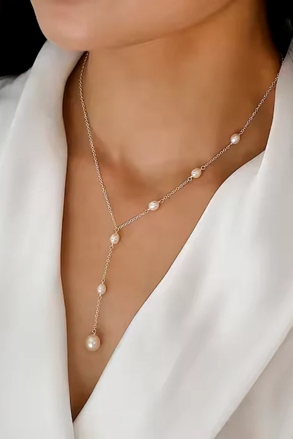 ELEGANTE COLGANTE DE RUBÍ Y COLLAR DE PERLAS