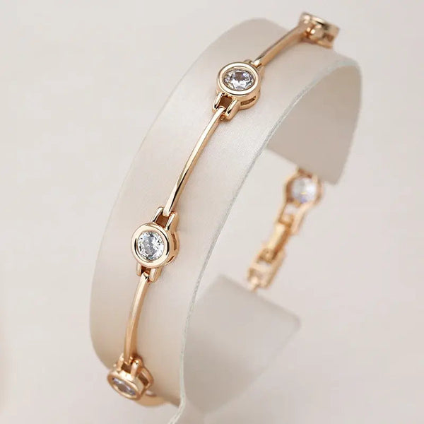 Elegante pulsera con circonitas en oro
