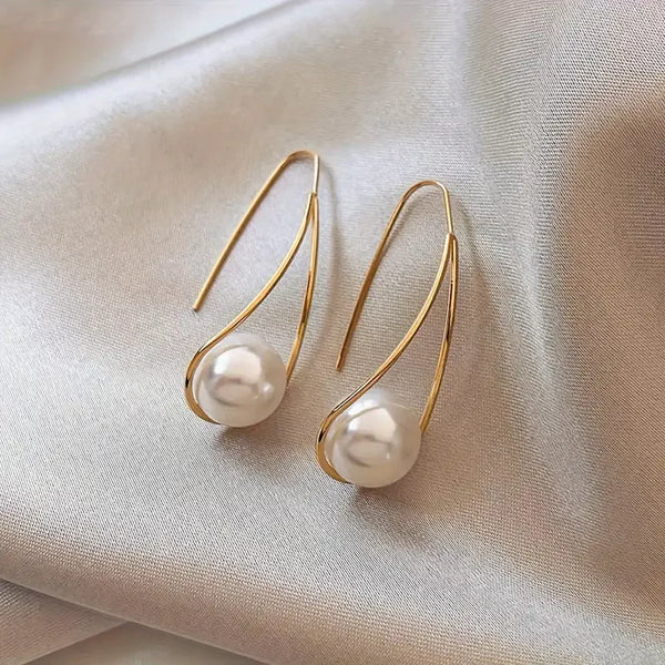 Elegantes pendientes colgantes de perlas | Oro