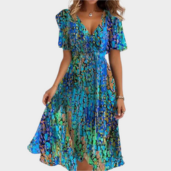 Vestido vaporoso con diseño floral y escote en V