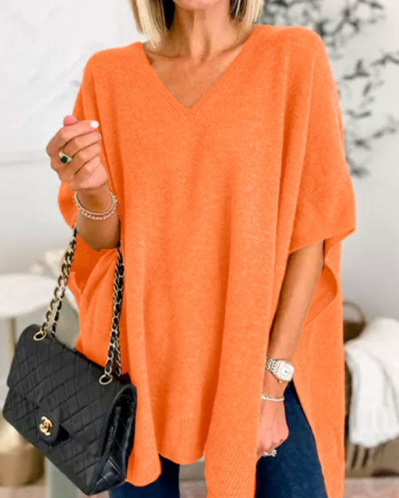 Erica - Suéter tipo poncho holgado de color liso con cuello en V 