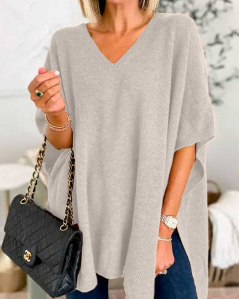 Erica - Suéter tipo poncho holgado de color liso con cuello en V 