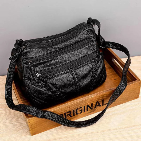 Zoe™ Classic Harmony | Bolso compacto y elegante