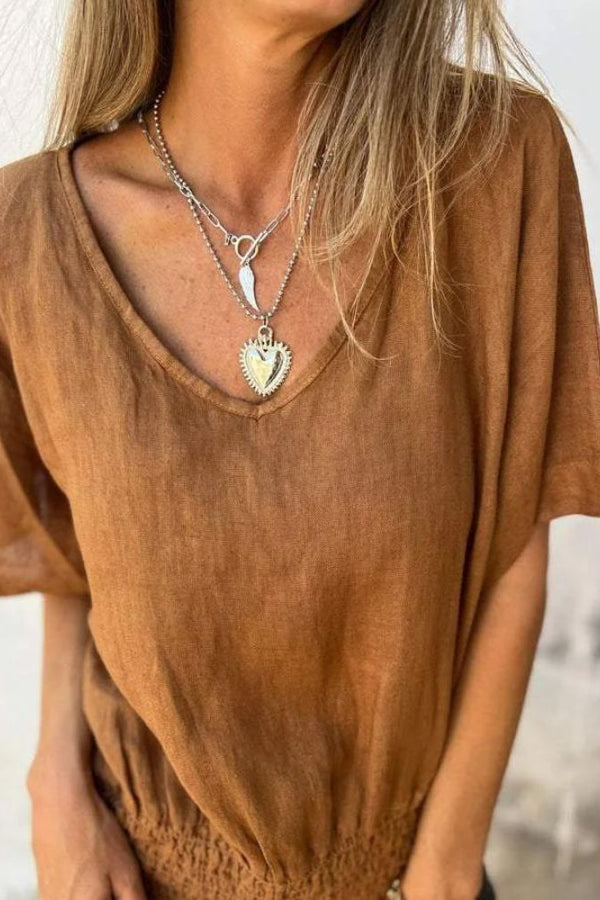 LENNOX – CAMISETA DE CUELLO EN V CON CORTE CERRADO 