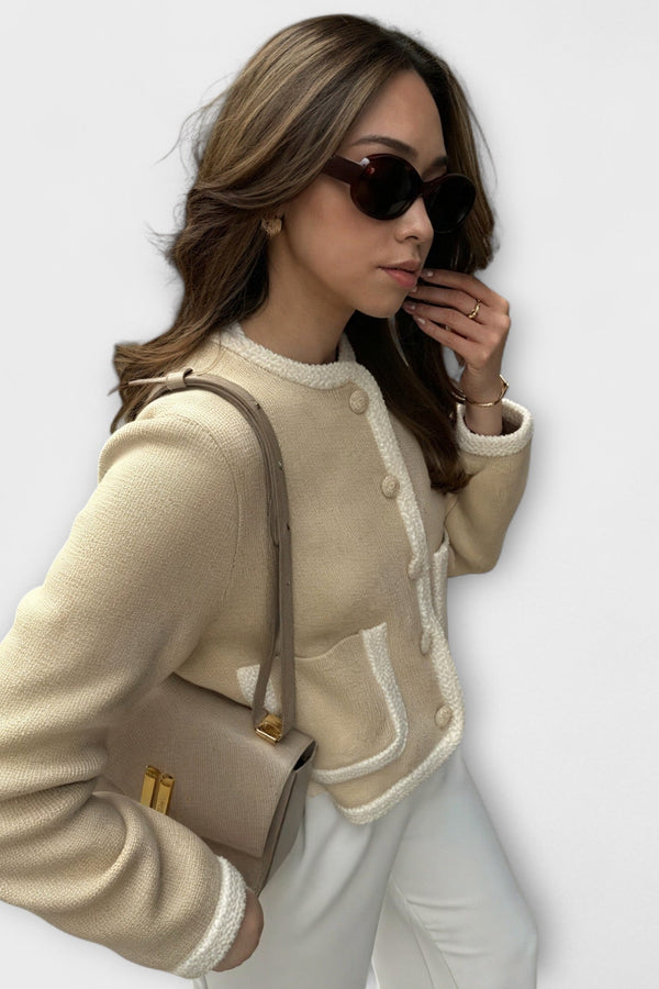 Cárdigan clásico con bolsillos decorativos