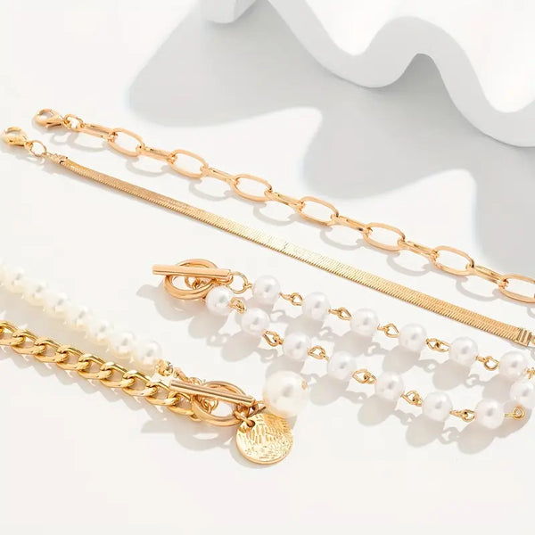 Conjunto elegante de 4 pulseras doradas: serpiente, perlas y eslabones | Oro