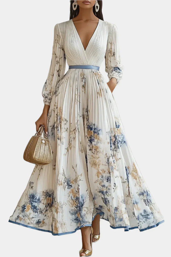 Vestido largo con mangas abullonadas y escote en pico