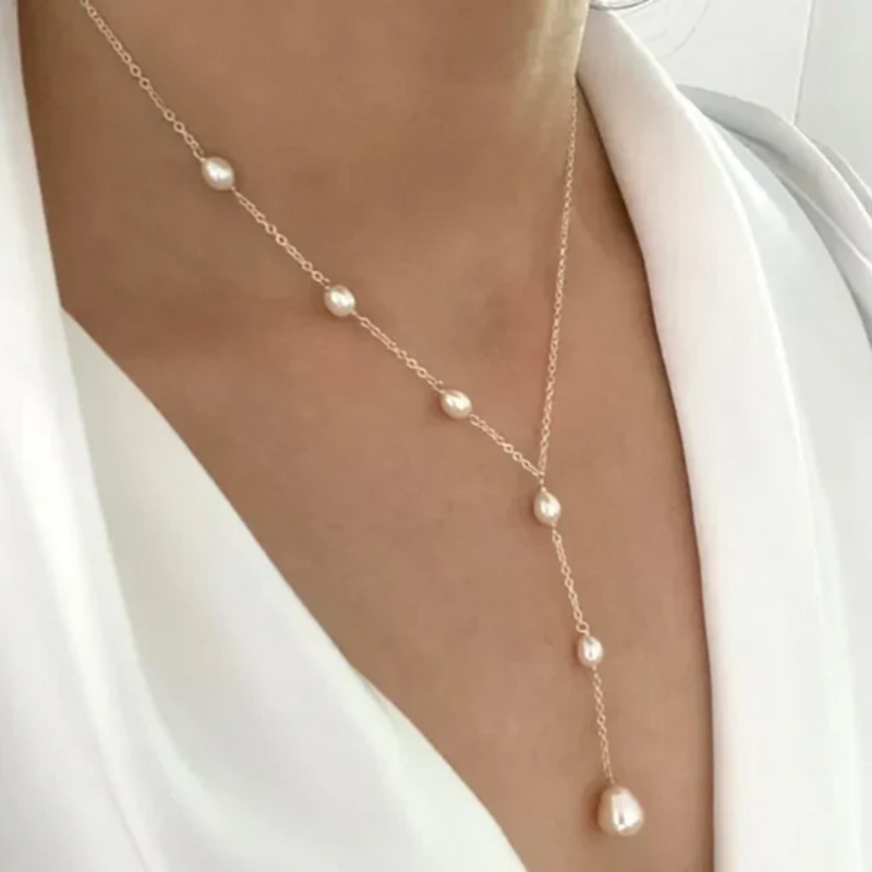 ELEGANTE COLGANTE DE RUBÍ Y COLLAR DE PERLAS
