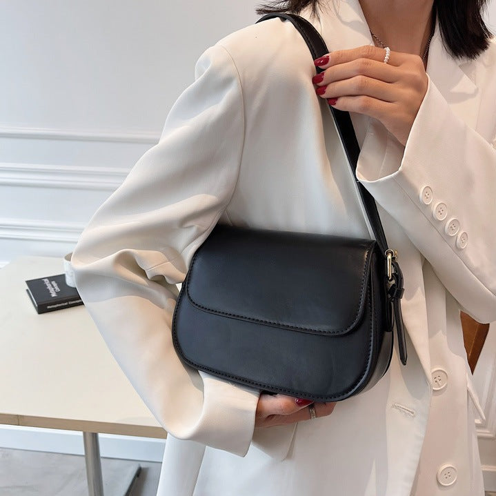 Bolso bandolera Avery™ Classic Saddle