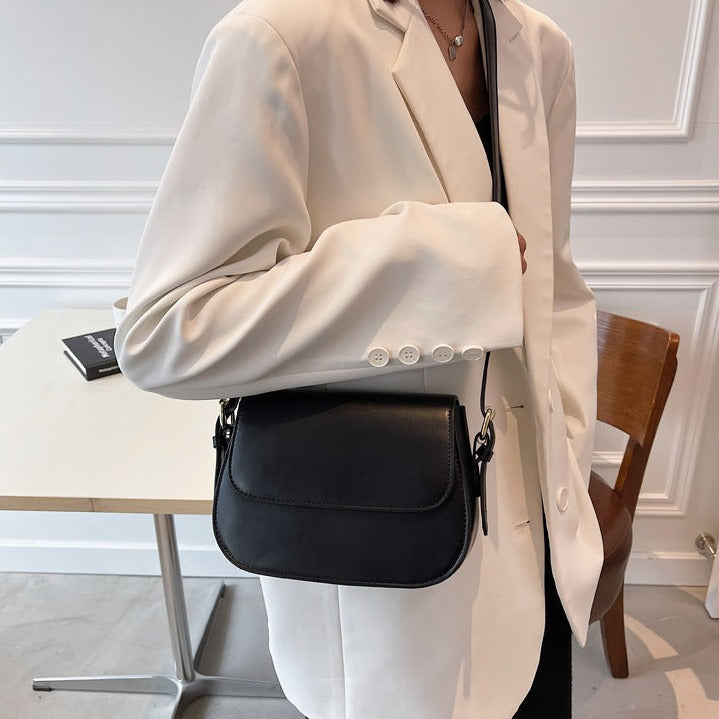 Bolso bandolera Avery™ Classic Saddle