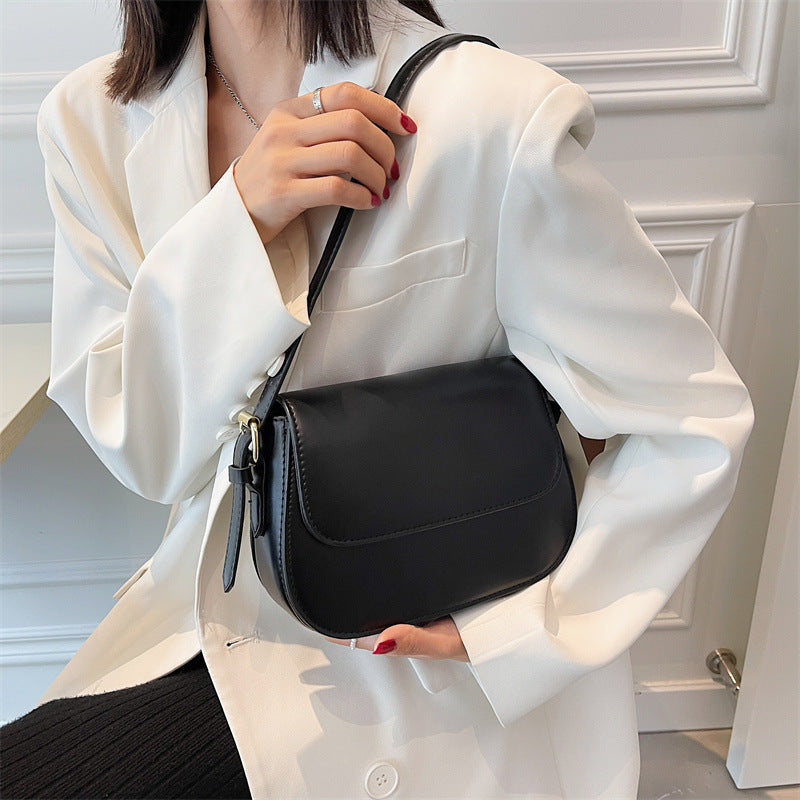 Bolso bandolera Avery™ Classic Saddle
