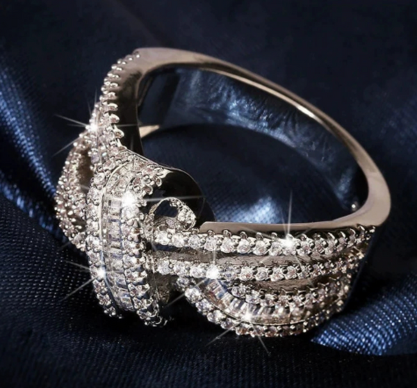 ANILLO DE PLATA TRENZADA BRILLANTE