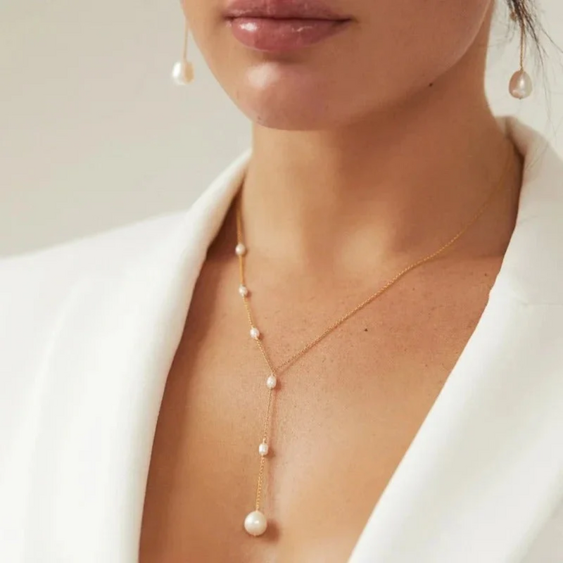 ELEGANTE COLGANTE DE RUBÍ Y COLLAR DE PERLAS