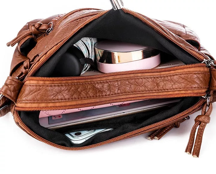 Zoe™ Classic Harmony | Bolso compacto y elegante
