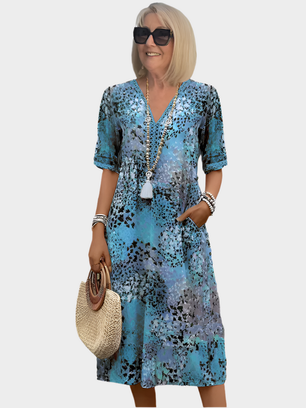 Vestido midi vibrante con bolsillos