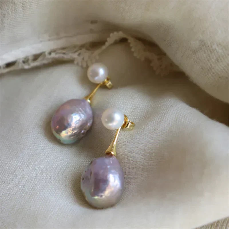 Exquisitos pendientes de perlas lilas | Oro