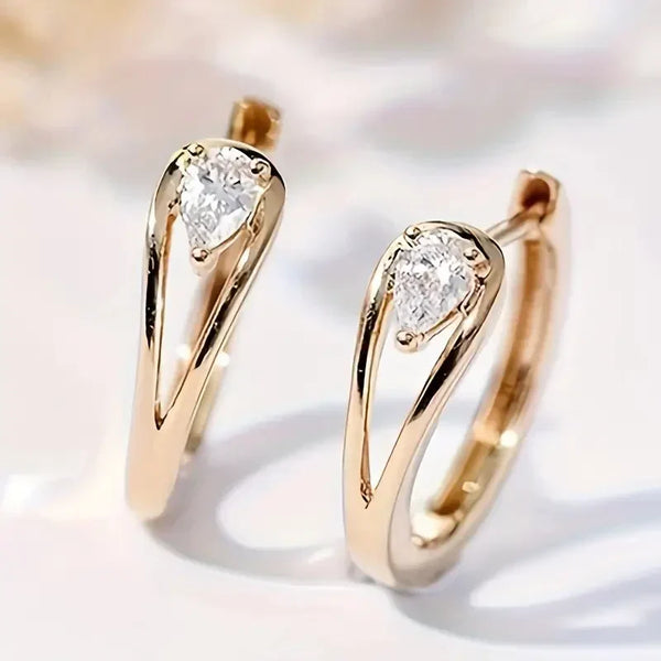 Exquisitos pendientes colgantes de circonita dorada | Oro
